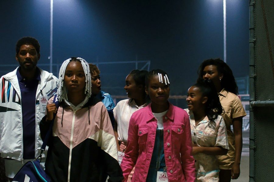 Will Smith, Saniyya Sidney, Aunjanue Ellis, Daniele Lawson, Demi Singleton, Layla Crawford and Mikayla Bartholomew star in a scene from the movie "King Richard." The Catholic News Service classification is A-III -- adults. The Motion Picture Association of America rating is PG-13 -- parents strongly cautioned. Some material may be inappropriate for children under 13. (CNS photo/Warner Bros. Pictures)